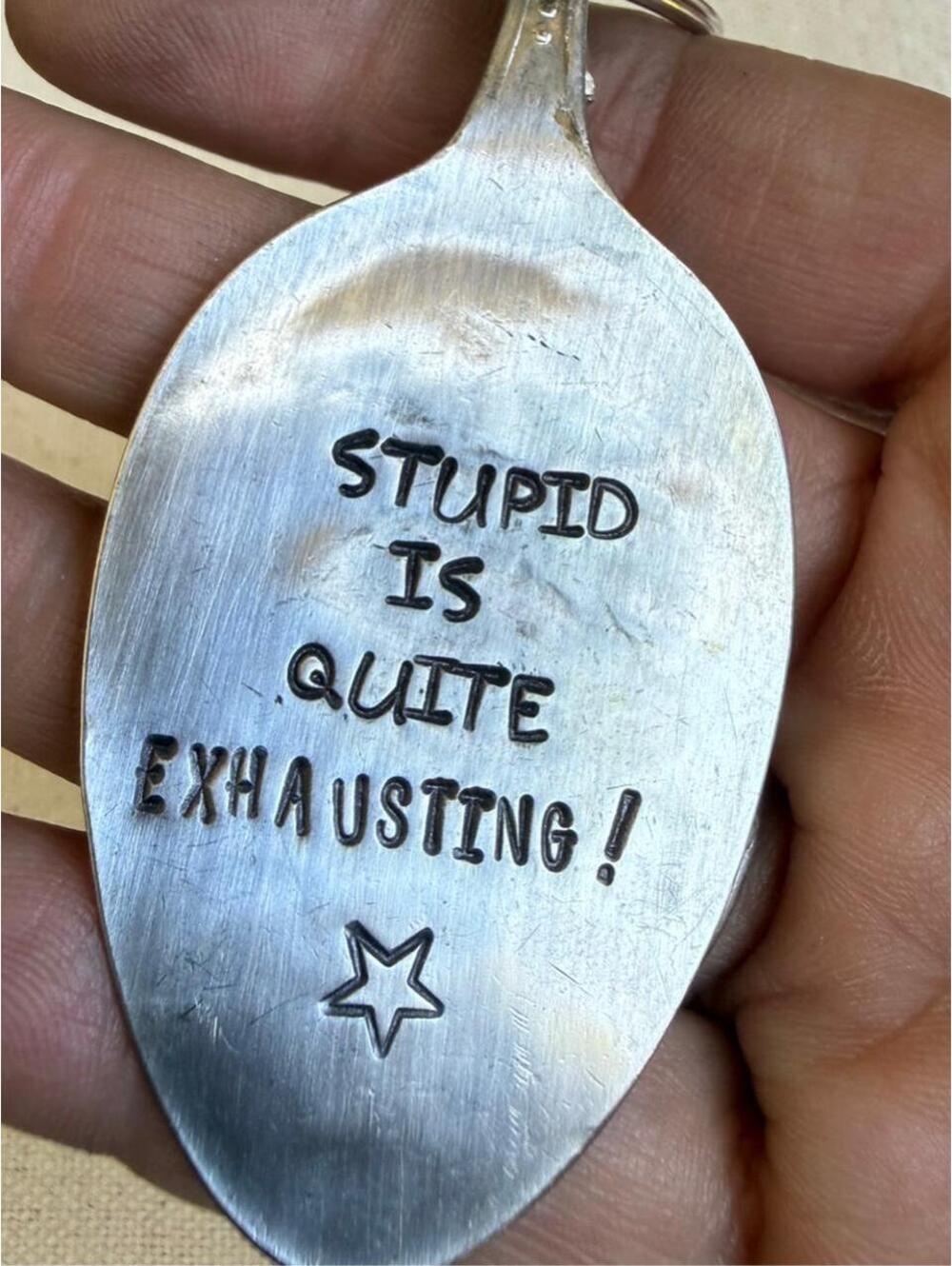Hand stamped vintage silverplate spoon keychain made from a repurposed teaspoon.